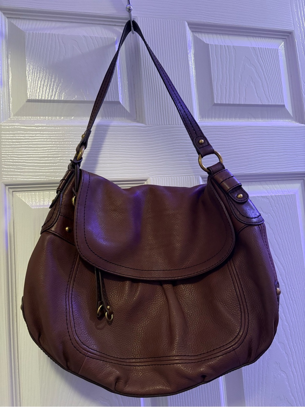 Fossil Pebbled Leather Shoulder Hobo in Dark Brown